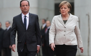 Меркель, Олланд и "тройка" готовят проект соглашения с Грецией