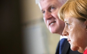 Merkel Under Pressure for Her Unwillingness to Build Barriers for Migrants