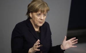 Merkel Condemns Shutting of Balkan Route for Migrants