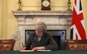 May Signs a Letter Triggering Article 50