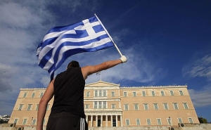 Greeks Sell Airports to German While Germans Vote on Greece Bailout