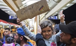 Власти Германии планируют потратить €17 млрд на мигрантов в 2016 году