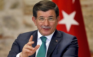 Davutoglu: Russia Threats with World War to Dictate its Policy