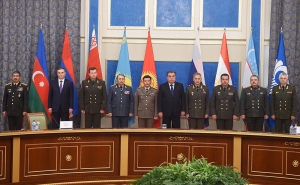 Being Afraid of Armenian Official, Azerbaijani Defense Minister Hides Behind the Flag