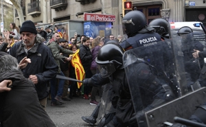 Clashes in Catalonia over Puigdemont's Arrest