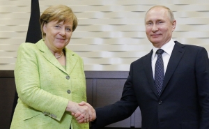 Меркель по-русски спросила у Путина про сибирское пальто