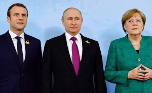 Putin Discusses Syria, Ukraine with Merkel, Macron

